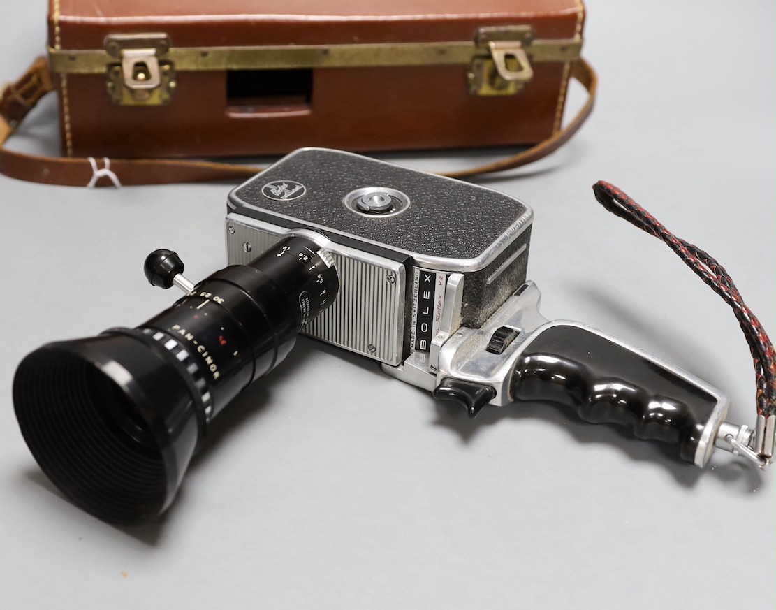 A vintage Bolex zoom reflex cine camera in original leather case